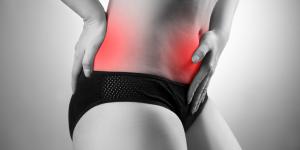 Estómago inflamado y dolor de espalda: causas y tratamiento