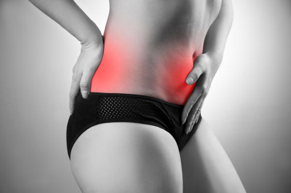 Estómago inflamado y dolor de espalda: causas y tratamiento